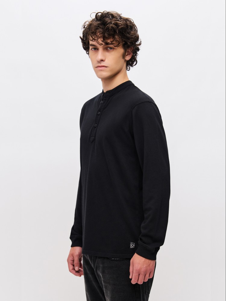 Dirty Laundry black long sleeve top with button placket